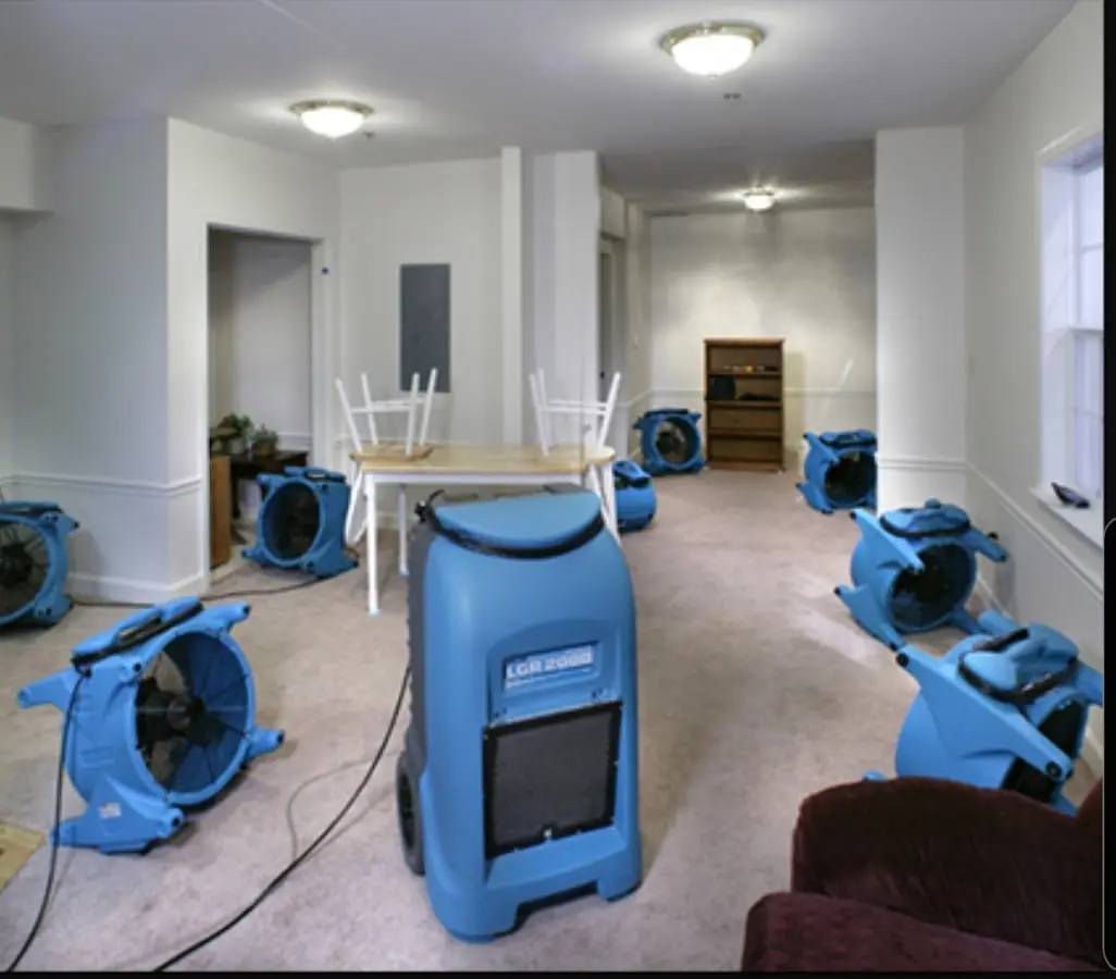 Air movers and dehumidifier setup for Water Damage Restoration in Tarrytown
